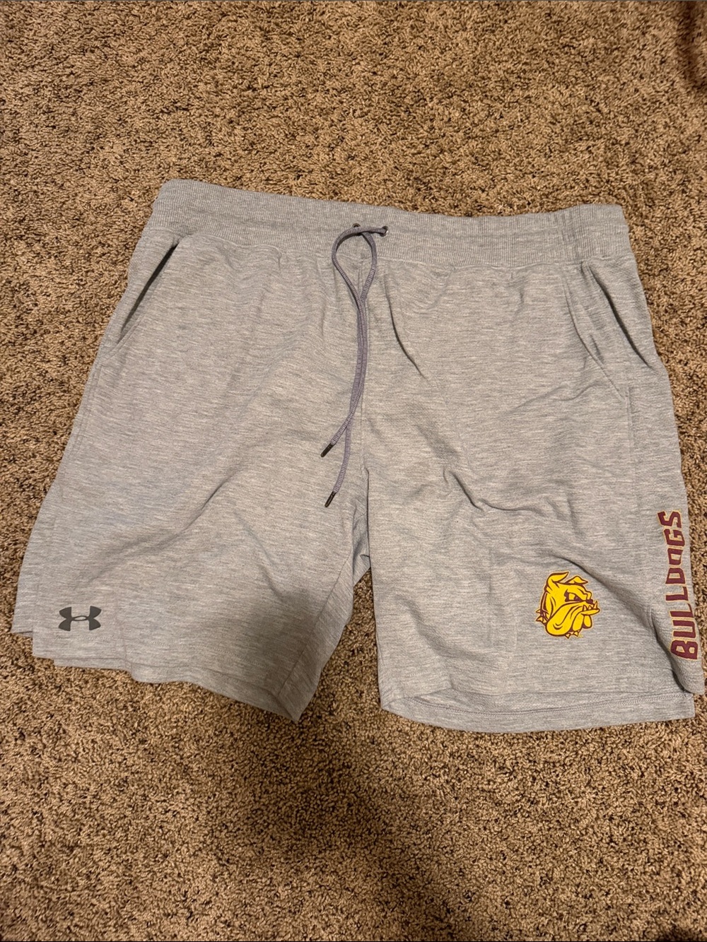 Under Armour Men’s Light Gray Bulldogs Athletic Shorts with Yellow Logo